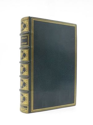 un livre noir avec des bordures dorées et une couverture aux bordures dorées