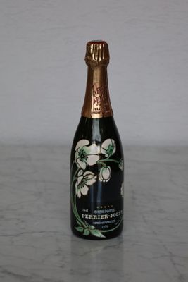 a bottle of wine that is sitting on a table