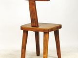 an image of a wooden chair sitting on top of a white floor