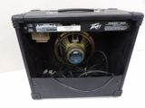 a close up of a guitar amplifier in a case on a table