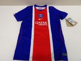a blue and red soccer jersey with a tag on it