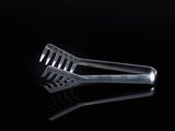 a fork that is sitting on a black surface