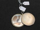 a locke with a mirror and a tag on it