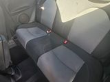 the back seats of a small car are empty and ready to be used