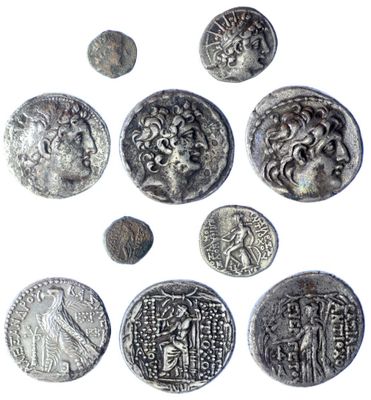 an image of a group of ancient coins on a white surface