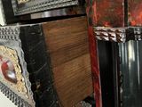 a close up of a wooden cabinet with a mirror on it