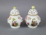 pair of chinese porcelain vases with birds and flowers painted on them
