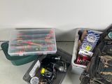 a bag of fishing gear on the floor next to a pair of gloves and a fishing rod