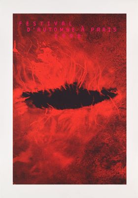 a red poster with a black hole in the middle of it