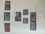 a lot of stamps that are on a sheet of paper