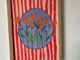 a picture of a painting hanging on the wall