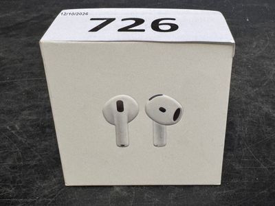 a box with two airpods in it on a table