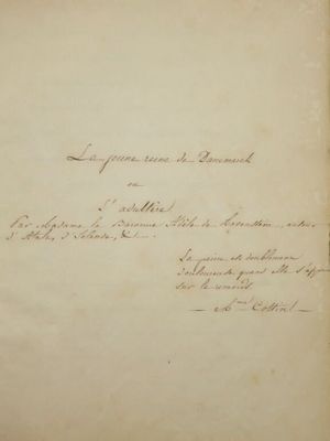 un vieux livre écrit posé sur une table