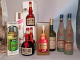 many different types of alcohol bottles on the counter