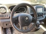 dashboard of a car with a steering wheel and dashboard controls