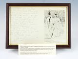 a framed drawing of a woman in a dress and a note