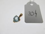 a close up of a small heart shaped pendant with a price tag