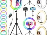 une photo d'un ensemble d'anneaux lumineux pour selfies, avec trépied et support pour téléphone