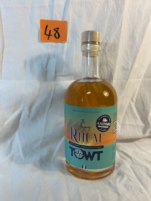 a bottle of rum that is sitting on a table