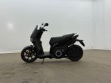 a scooter that is parked in a large room