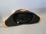a black hat with a gold buckle on top of it