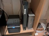 a small cabinet with a bunch of electronics on it