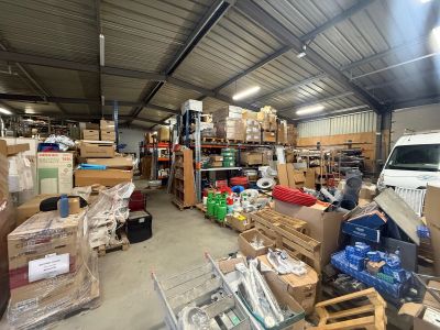 a large warehouse filled with lots of boxes and boxes