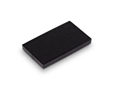 un gros plan d'une petite boîte noire posée sur une surface blanche