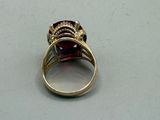 an image of a ring with a garnetite stone