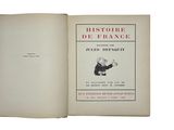 an open book with a picture of a man in a suit