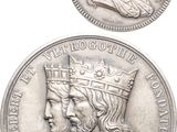 gros plan d'une pièce de monnaie surmontée d'une couronne
