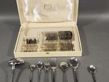 a box of silverware with spoons and spoons in it