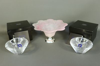 two small glass vases and a small glass bowl on a table