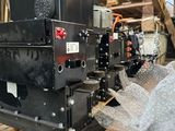 an image of a couple of machines sitting on top of a wooden pallet