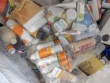 many different types of skin care products in a plastic bag