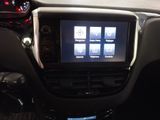 a picture of a car dashboard with a display on it
