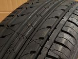 a close up of a tire on a cardboard box