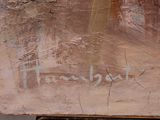 a close up of a piece of wood with writing on it