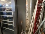 an image of a commercial oven in a warehouse
