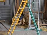 a ladder leaning up against a wall in a building