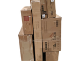many boxes stacked on top of each other on a pallet