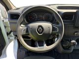 the interior of a car with a steering wheel and dashboard controls