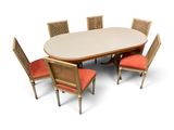 a large oval dining table with six chairs around it