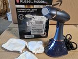 a box of tissues and a blow dryer sitting on a table