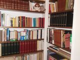 a room with a lot of books on the shelves