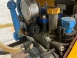 a close up of a machine that is on a pallet