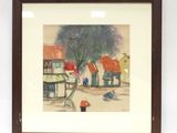 tableau encadré représentant une scène de rue avec des maisons et une borne d'incendie