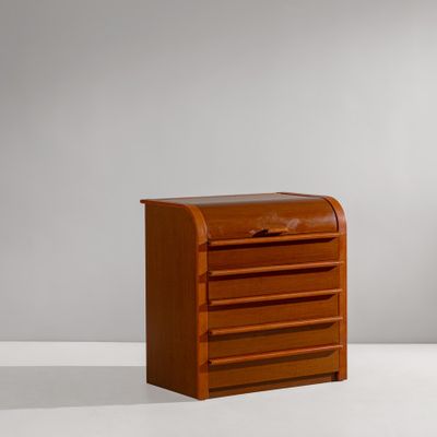 a small wooden chest of drawers on a white surface