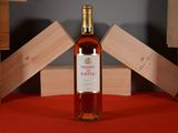 a bottle of wine that is sitting on a table