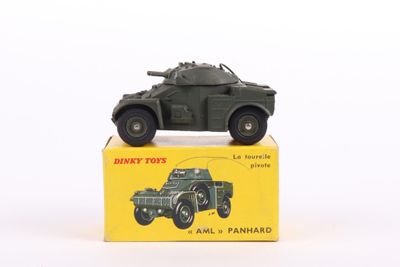 a toy army vehicle sitting on top of a box